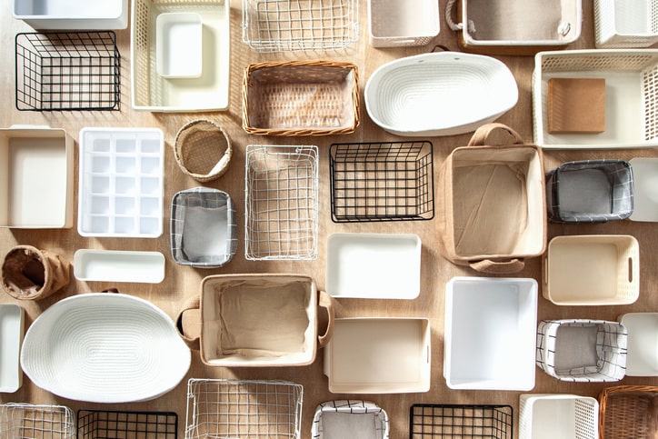 Flat lay of storage containers and baskets of different sizes and shapes.