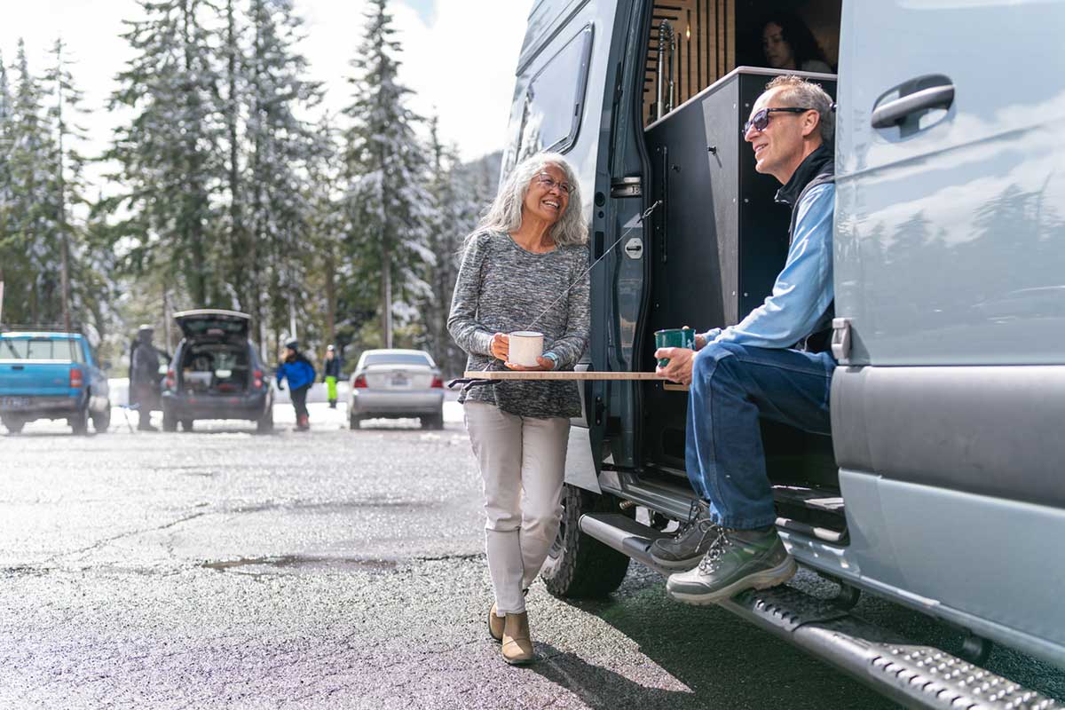 Couple outside RV.